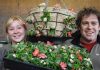 Alice Buschl and Mike Gafa, from the Nelmac Nursery team with some of the flowers that will be going up in the Nelson CBD this week. Photo: Sinead Ogilive.