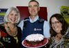 Nelson’s Peter Crins with the cake he won for helping sign up more streets to Neighbourhood Support than any other community constable. He is pictured with baker Beverley Ewbank and Neighbourhood Support coordinator Kim MacDonald. Photo: Sinead Ogilvie.