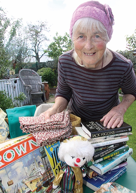 Margaret Green with the recycled and donated goods she sells at a local car boot sale. Photo: Sinead Ogilvie.