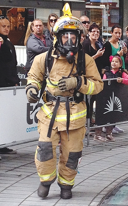 Stoke volunteer firefighter Mark Janssen during Saturday's Sky Tower Stair Challenge in Auckland. Photo: Niki Walton.
