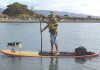 Mark Rayner arrives at Tahunanui after completing his SUP journey from Marahau on Friday.